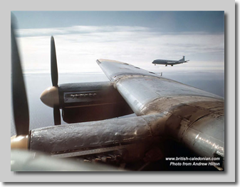 An RAF Nimrod escorts the Lanc in